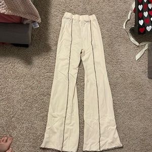 Tan flare leggings, with brown seams from shein